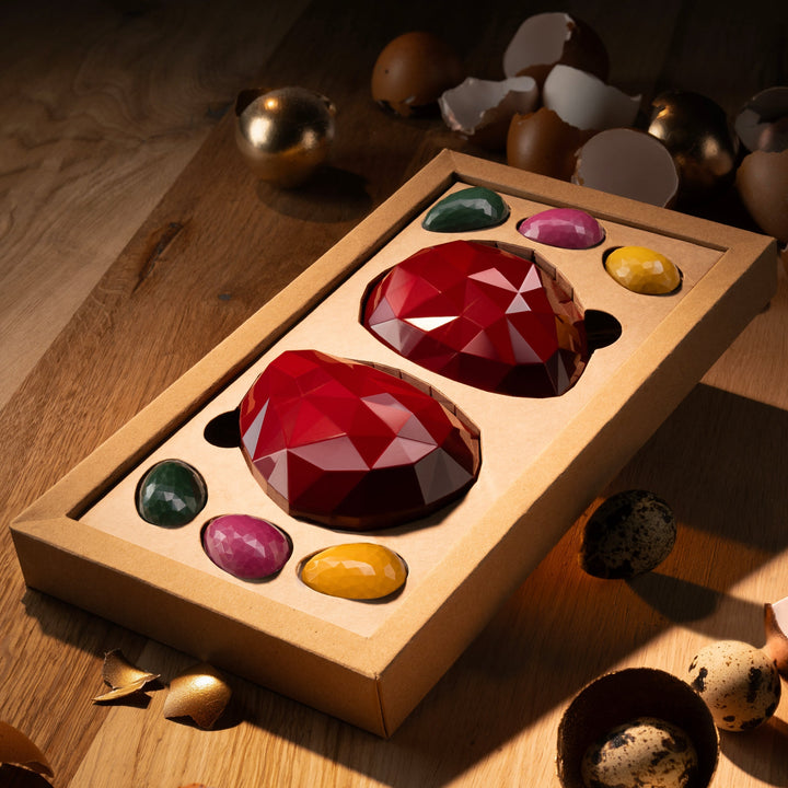 Two Fabergé eggs with garnish