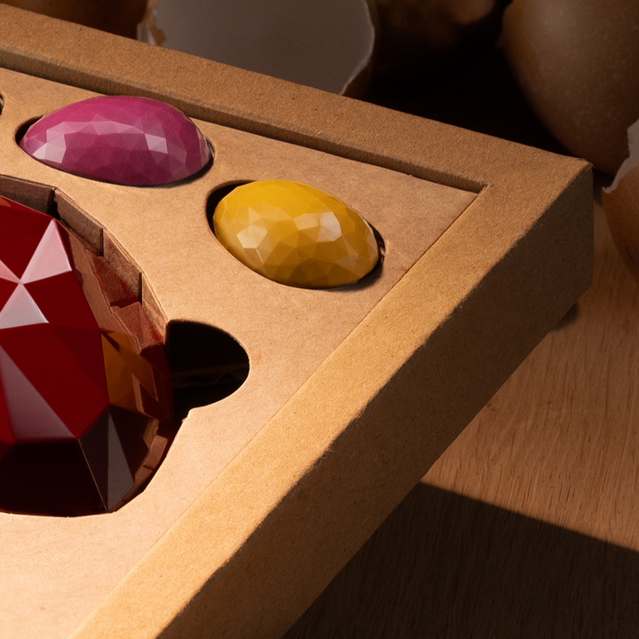 Two Fabergé eggs with garnish